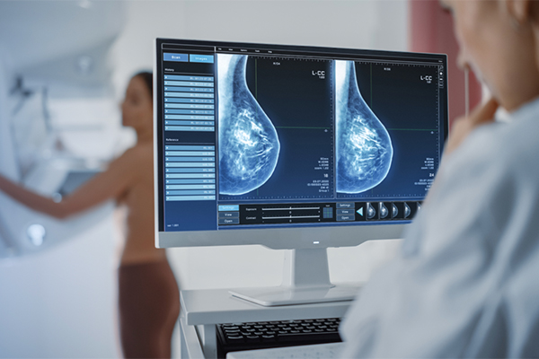 woman having mammogram
